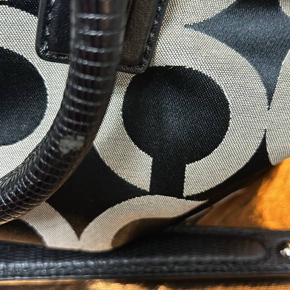 Coach purple lined bag with tags and shoulder strap black...